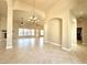 Bright and spacious living room featuring tile floors, a fireplace, and recessed lighting at 5451 Fernwood Ct, Pahrump, NV 89061