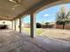 Covered patio overlooking the landscaped backyard at 5451 Fernwood Ct, Pahrump, NV 89061