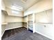 Spacious walk-in closet with custom shelving and carpet flooring at 5451 Fernwood Ct, Pahrump, NV 89061