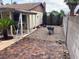 Backyard with decorative brick landscaping, new construction, and desert landscaping at 5821 Santa Catalina Ave, Las Vegas, NV 89108