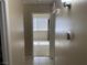 Neutral hallway leads to bedroom, providing a glimpse into the bright space at 5821 Santa Catalina Ave, Las Vegas, NV 89108