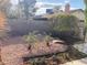 Landscaped backyard with decorative rock offers a low-maintenance and visually appealing space at 5821 Santa Catalina Ave, Las Vegas, NV 89108