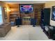 Bright living room with built-ins and fireplace, offering ample space and character at 5821 Santa Catalina Ave, Las Vegas, NV 89108