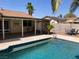 Sparkling swimming pool with patio area, perfect for outdoor relaxation and entertaining at 5821 Santa Catalina Ave, Las Vegas, NV 89108