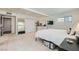 Spacious bedroom with plush carpeting, white walls, and access to an exterior entry at 615 D Ave, Boulder City, NV 89005
