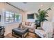 Cozy living room featuring large window and comfortable seating at 615 D Ave, Boulder City, NV 89005