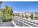 Balcony overlooking the street and community, providing ample sunlight and views at 6217 Lapilli Ave, Las Vegas, NV 89139