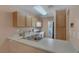 Well-lit kitchen with modern appliances and generous counter space at 6217 Lapilli Ave, Las Vegas, NV 89139