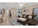 Spacious living room featuring a plush sofa, open layout, and neutral decor at 6217 Lapilli Ave, Las Vegas, NV 89139
