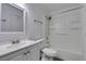 Clean bathroom with a shower-tub combo, white fixtures, and updated vanity at 6800 E Lake Mead Blvd # 1034, Las Vegas, NV 89156