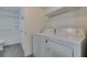 This bathroom features a tub and shower combination and full-size laundry units at 6800 E Lake Mead Blvd # 1034, Las Vegas, NV 89156