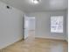 This bedroom offers neutral walls, plank flooring, and large window at 6800 E Lake Mead Blvd # 1034, Las Vegas, NV 89156