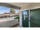 Private patio with sliding glass doors, offering an outdoor living space at 6800 E Lake Mead Blvd # 1034, Las Vegas, NV 89156