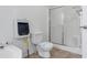Bathroom with shower, toilet, and additional heater unit at 70 Camp Bonanza Rd, Las Vegas, NV 89124