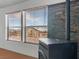 Close up on living room windows and wood burning fireplace in open plan room at 70 Camp Bonanza Rd, Las Vegas, NV 89124