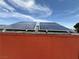 Solar panels atop the shed collect energy at 70 Camp Bonanza Rd, Las Vegas, NV 89124