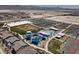 Aerial view of the community featuring playgrounds, sports courts, and parking at 7107 Tilligerry St, North Las Vegas, NV 89084
