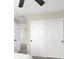 Bedroom featuring closet with sliding doors for storage at 7107 Tilligerry St, North Las Vegas, NV 89084