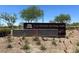 Tule Springs Regional Park sign with native plants and trees at 7107 Tilligerry St, North Las Vegas, NV 89084
