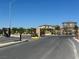 Community entrance with large gates and neatly landscaped surroundings at 7107 Tilligerry St, North Las Vegas, NV 89084