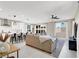 Open-concept living space with modern kitchen, comfortable seating, and stylish decor at 7107 Tilligerry St, North Las Vegas, NV 89084