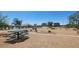 Community park with picnic tables, desert landscaping, and walking paths at 7107 Tilligerry St, North Las Vegas, NV 89084