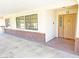 Inviting entryway featuring a decorative front door and brick detailing at 731 W Calvada Blvd, Pahrump, NV 89048