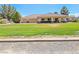Charming home with a well-manicured lawn and a spacious three-car garage at 731 W Calvada Blvd, Pahrump, NV 89048