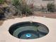 Cozy hot tub surrounded by desert plants, providing a relaxing outdoor experience at 731 W Calvada Blvd, Pahrump, NV 89048