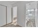 Modern bathroom features a glass enclosed shower, stylish vanity, and wood-look tile flooring at 765 Butternut Ct, Henderson, NV 89014