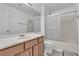 Bathroom with updated vanity, sink, mirror, and tiled shower/tub combo at 765 Butternut Ct, Henderson, NV 89014