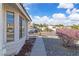 Landscaped front yard with decorative stone, shrubbery, and view of neighboring homes at 765 Butternut Ct, Henderson, NV 89014