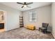 Bedroom featuring soft carpet, neutral paint, ceiling fan and lots of natural light at 7761 Sagamore Bay Ct, Las Vegas, NV 89179