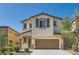 Charming two-story home with neutral stucco, brown shutters, and a two-car garage at 7761 Sagamore Bay Ct, Las Vegas, NV 89179