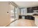 Kitchen with sliding glass doors leading to the outdoor patio area at 7761 Sagamore Bay Ct, Las Vegas, NV 89179