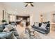 Bright, open-concept living room and kitchen with modern furnishings and neutral decor at 7761 Sagamore Bay Ct, Las Vegas, NV 89179