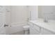 The bathroom is equipped with a shower-tub combo and a sleek, modern vanity at 7777 Vino Vranec Ct, Las Vegas, NV 89113