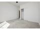 Bright bedroom boasts closet and doorway, offering comfort and accessibility at 7777 Vino Vranec Ct, Las Vegas, NV 89113