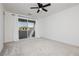 Bright bedroom with sliding door, offering comfort, and access to outdoor space at 7777 Vino Vranec Ct, Las Vegas, NV 89113