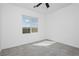 A sunny bedroom with scenic window view offers a relaxing space at 7777 Vino Vranec Ct, Las Vegas, NV 89113