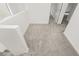 Loft on upper level with plush gray carpet and white trim at 7777 Vino Vranec Ct, Las Vegas, NV 89113