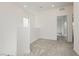 Loft area with light gray carpet and neutral-toned walls at 7777 Vino Vranec Ct, Las Vegas, NV 89113