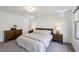 Cozy bedroom with neutral tones, soft carpeting, and modern furnishings at 8042 Misty Canyon Ave, Las Vegas, NV 89113