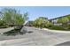 Inviting entrance to the Skyview Terrace community, featuring landscaping and modern homes at 8042 Misty Canyon Ave, Las Vegas, NV 89113