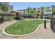 Community dog park with seating and shady spot providing a fun area for pets and their owners at 8042 Misty Canyon Ave, Las Vegas, NV 89113