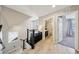 Second floor hallway featuring wood floors and open doorways to the bath and bedroom at 8042 Misty Canyon Ave, Las Vegas, NV 89113