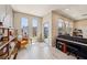 Open living room with modern decor, large windows, and ample natural light at 8042 Misty Canyon Ave, Las Vegas, NV 89113