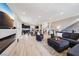 Cozy open-concept living space featuring modern decor, and plenty of natural light at 8042 Misty Canyon Ave, Las Vegas, NV 89113