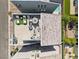 Birds eye view of rooftop deck with dining area, lounge furniture, and artificial turf at 8042 Misty Canyon Ave, Las Vegas, NV 89113