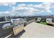 Inviting rooftop deck equipped with a grill and chaise lounges, ideal for outdoor living and relaxation at 8042 Misty Canyon Ave, Las Vegas, NV 89113